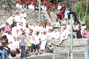 Pilgrims awaiting the baptism at the edge of the Jordan River