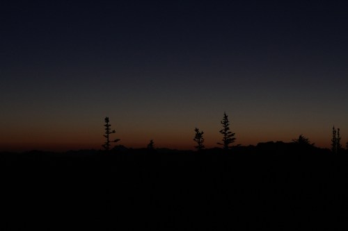 Arriving at Sunrise Point about half an hour before sunrise, I found 20 or so people already awaiting with cameras and tripods ready.  The glow advancing up the horizon  was rich with color and promise.