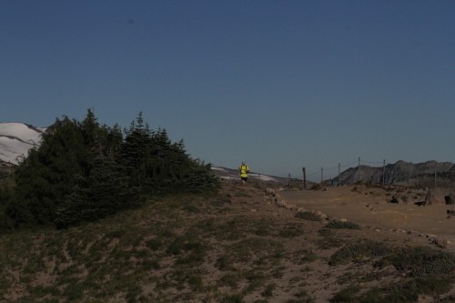 My friend trail running early in the morning at Sunrise.