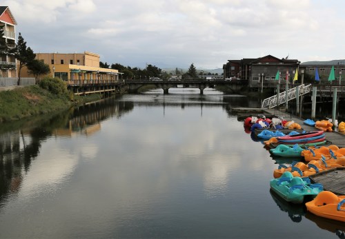 Necanicum River with Quatat Park on the right in Seaside, Oregon.