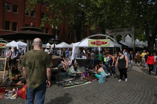 These are the some of the street people semi-stalls. These were not part of the official Saturday Market, but they tried to take advantage of the crowd. There were large numbers of homeless in this area. Between the marijuana, the unwashed bodies, the multiple open air grilles of a variety of ethnic food choices, it was unusually aromatic.